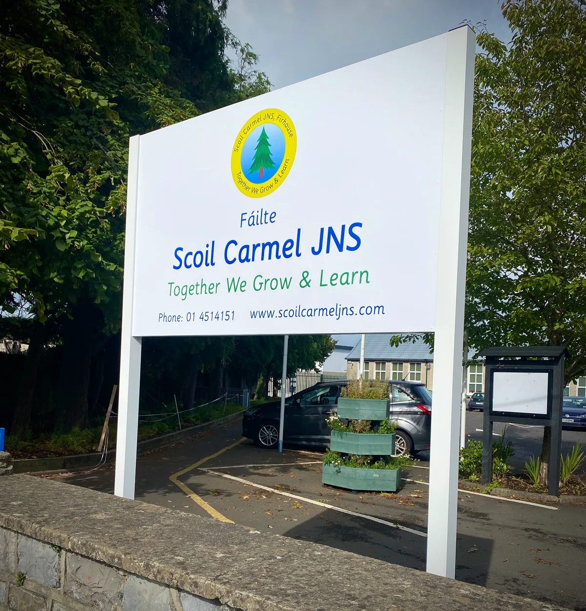 The Scoil Carmel JNS sign at the school entrance on Firhouse Road, Dublin 24.
